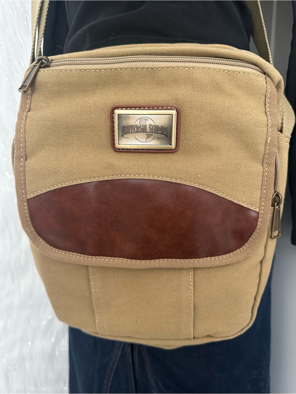 Universal Tan Canvas Messenger Bag with Brown Accent Plate